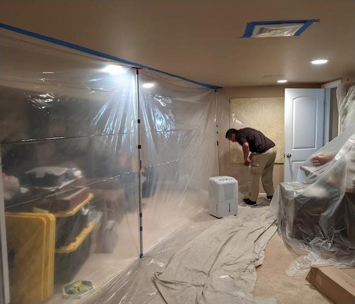 containment zone set up in a room with mold damage