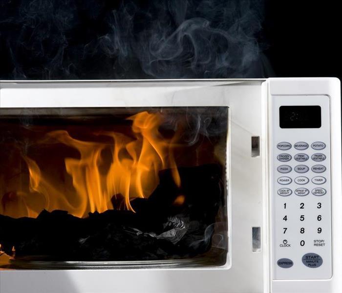 microwave caught fire