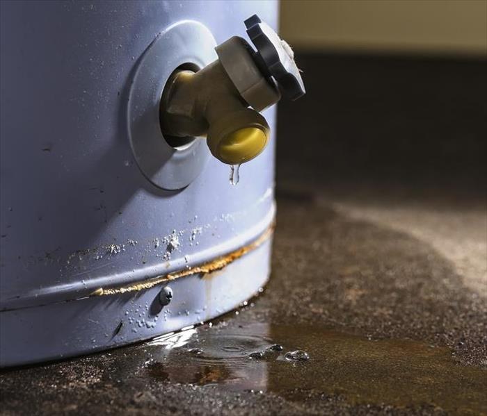 leaking water heater; water beginning to pool on floor
